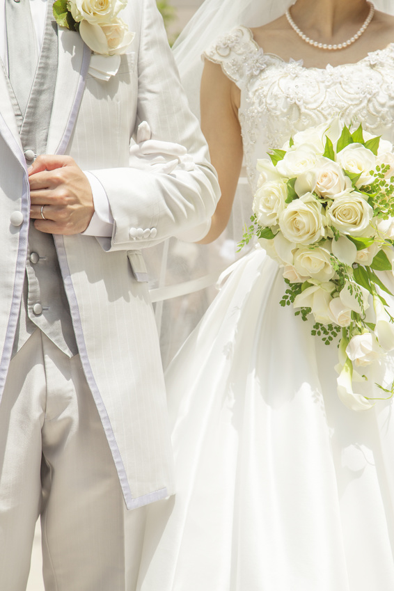 Wedding image.Couple linking arms.Marriage.Dress.Fashion