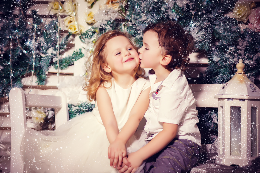 Little boy and girl in love in christmas