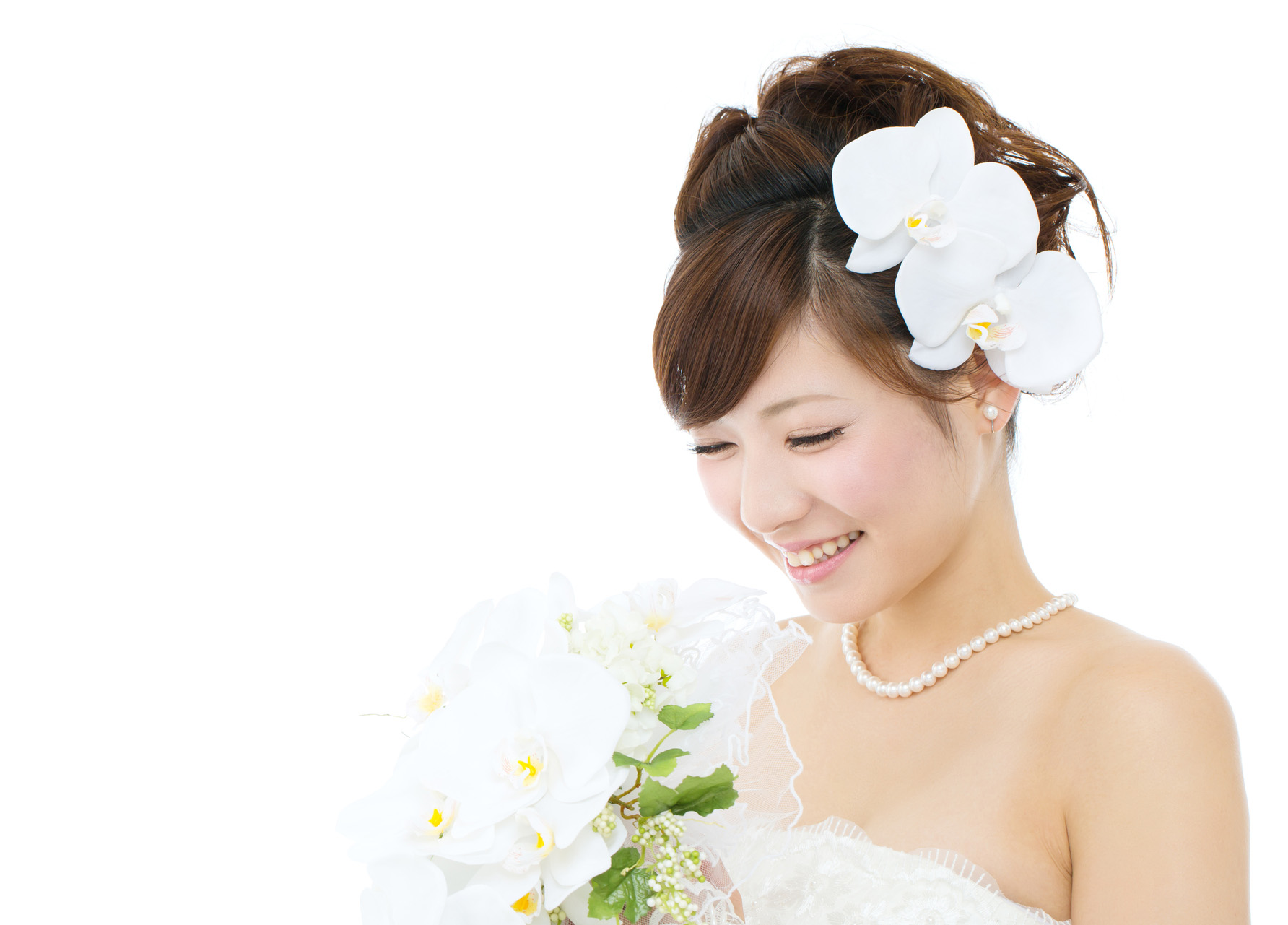 Beautiful asian woman dressed as a bride on white background