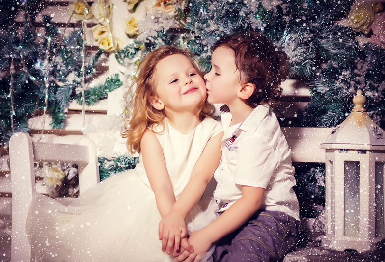 Little boy and girl in love in christmas