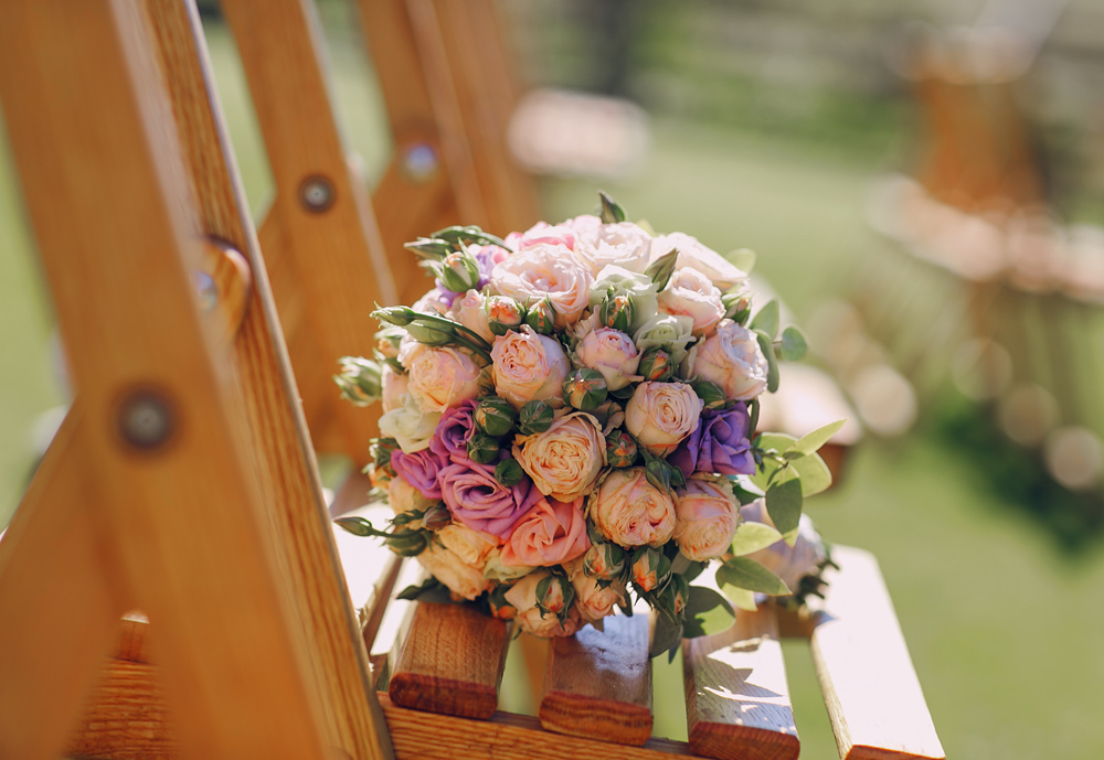 Beautiful wedding decorations for the ceremony outside in sunny weather