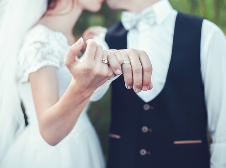 Beautiful gold rings for ceremony on wedding